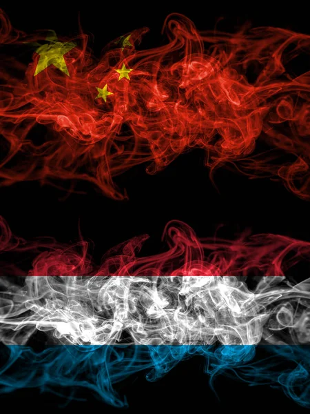 China Chinese Luxembourg Smoky Mystic Flags Placed Side Side Thick — 图库照片