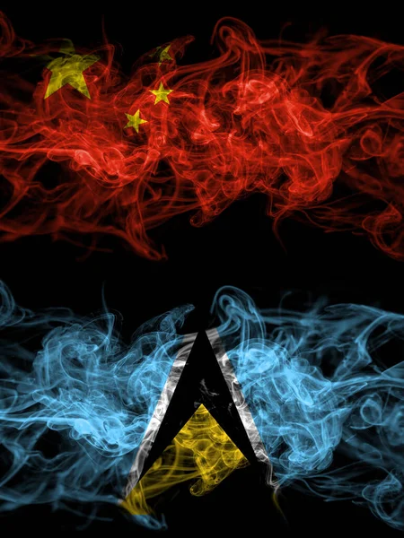 China Chinese Saint Lucia Smoky Mystic Flags Placed Side Side — Stockfoto