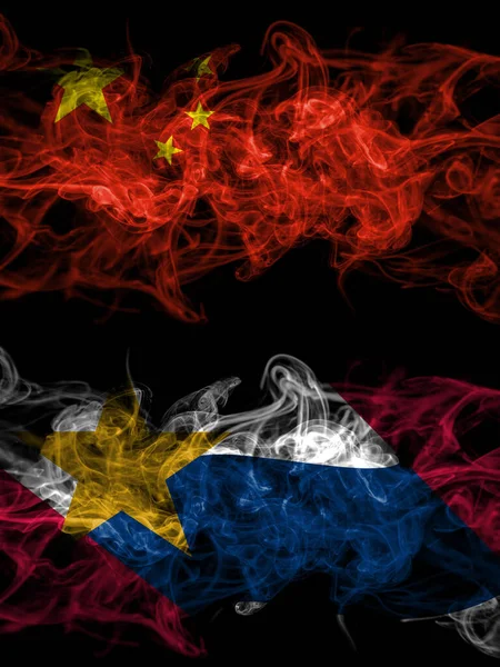China, Chinese vs United States of America, America, US, USA, American, Lafayette, Indiana smoky mystic flags placed side by side. Thick colored silky abstract smoke flags.