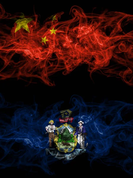 China, Chinese vs United States of America, America, US, USA, American, Maine smoky mystic flags placed side by side. Thick colored silky abstract smoke flags.