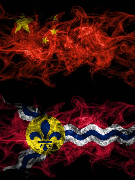 China, Chinese vs United States of America, America, US, USA, American, Saint Louis, Missouri smoky mystic flags placed side by side. Thick colored silky abstract smoke flags.