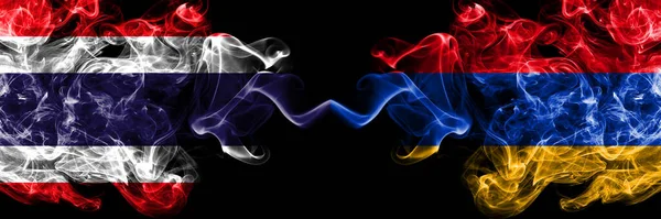 Thailand, Thai vs Armenia, Armenian smoky mystic flags placed side by side. Thick colored silky abstract smokes flags.