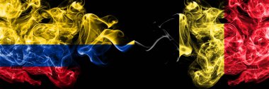 Kolombiya, Kolombiya Belçika 'ya karşı, yan yana yerleştirilmiş Belçika dumanlı mistik bayrakları. Kalın renkli ipeksi soyut sigara bayrakları.