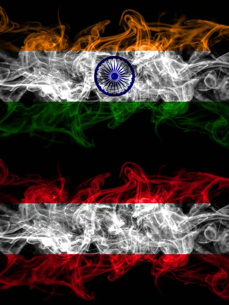 印度对奥地利 奥地利烟熏神秘的旗帜并排放置 浓密的彩色丝状抽象烟旗 — 图库照片