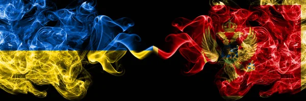 乌克兰 乌克兰对黑山 黑山烟熏神秘的旗帜并排放置 浓密的彩色丝状抽象烟雾旗 — 图库照片