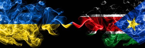 Ukrajina Ukrajina Jižní Súdán Kouřové Mystické Vlajky Umístěné Bok Boku — Stock fotografie