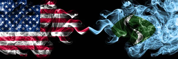 United States of America, America, US, USA, American vs Japan, Japanese, Shiriuchi, Hokkaido, Oshima, Subprefecture smoky mystic flags placed side by side. Thick colored silky abstract smoke flags.