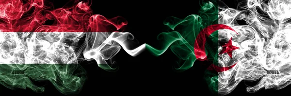 Hungary Hungarian Algeria Algerian Smoky Flags Side Side — Stock Photo, Image