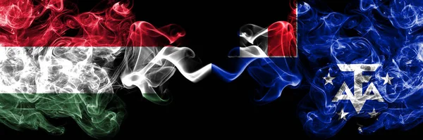 Ουγγαρία Ουγγαρία Εναντίον Γαλλίας Γαλλίας Νότιας Και Ανταρκτικής Καπνιστή Σημαίες — Φωτογραφία Αρχείου