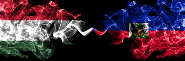 Hungary Hungarian Haiti Smoky Flags Side Side — Stock Photo, Image