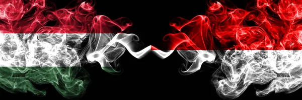 Венгрия Венгрия Против Индонезии Индонезийские Дымовые Флаги Бок Бок — стоковое фото
