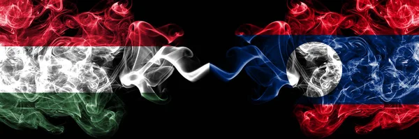 Ungern Ungern Laos Rökiga Flaggor Sida Vid Sida — Stockfoto