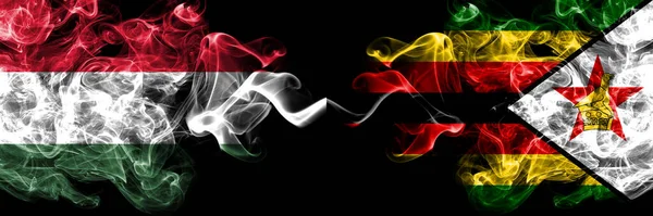 匈牙利 匈牙利与津巴布韦 津巴布韦 齐博烟熏国旗肩并肩 — 图库照片