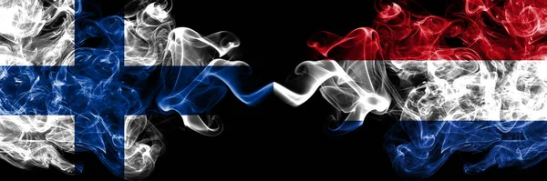 Finland Finnish Netherlands Dutch Holland Smoky Flags Side Side — Stock Photo, Image