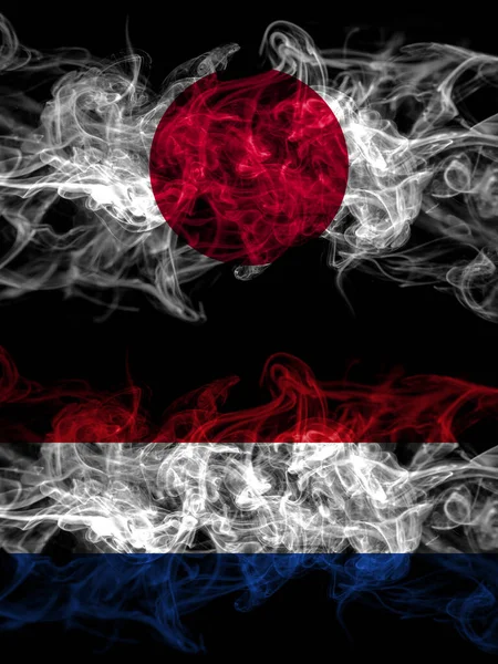 Прапори Куріння Японії Японії Нідерландах Голландії — стокове фото