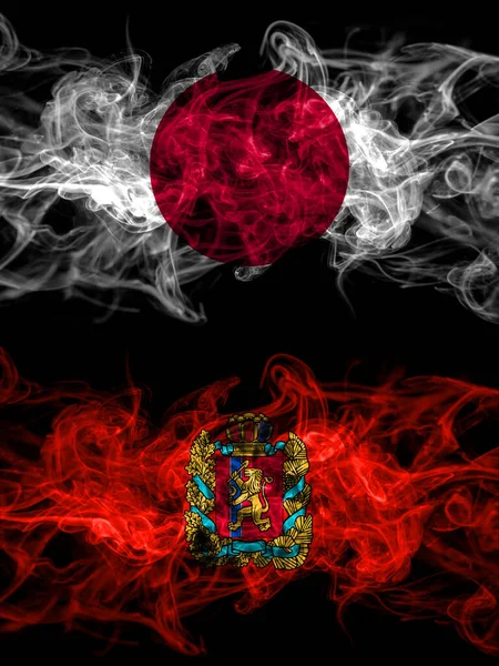 Прапори Куріння Японії Японії Росії Росії Росії Красноярського Краю — стокове фото
