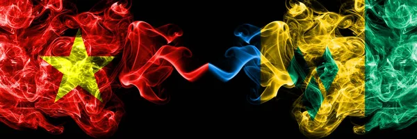 Vietnam, Vietnamlılar Saint Vincent 'e karşı ve Grenadinler yan yana duman bayrakları tüttürüyor.