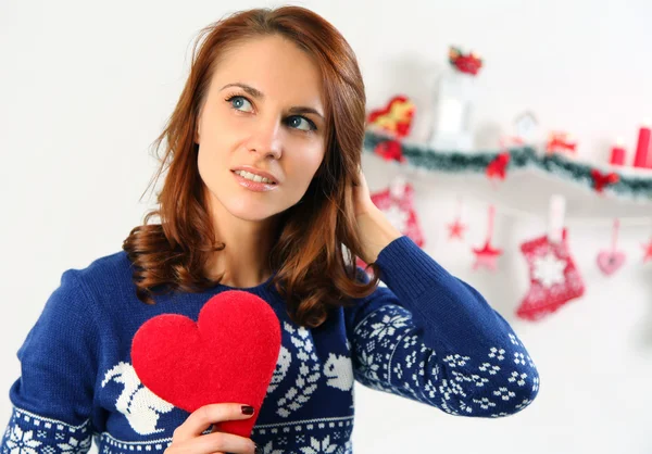 Woman holding red heart — Stock Photo, Image