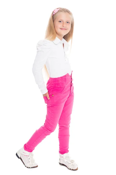Little girl six years in pink jeans — Stock Photo, Image