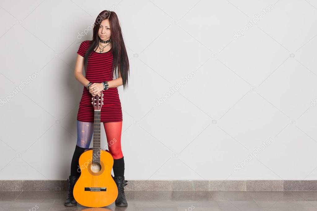 Asian girl with a guitar