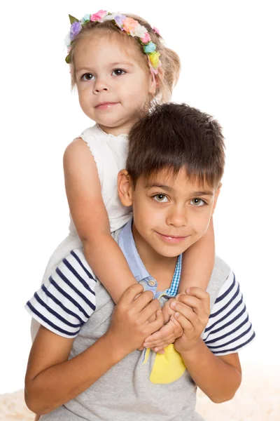 Playing older brother and sister — Stock Photo, Image