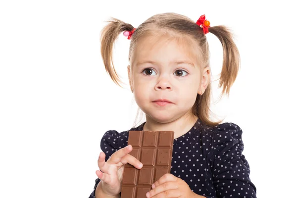 Kleines Mädchen mit einer Schokolade — Stockfoto