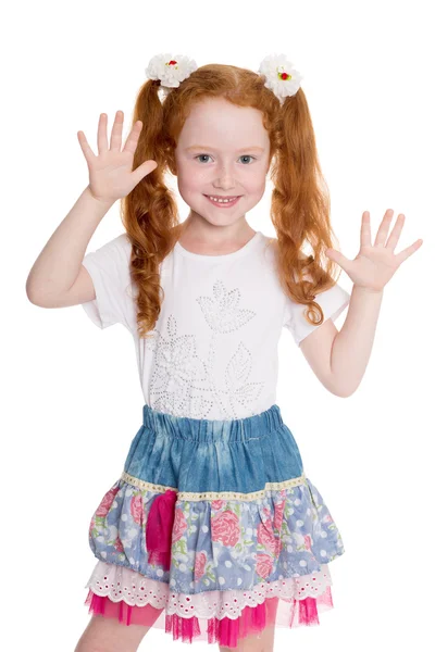 Playful little girl with hands raised — Stock Photo, Image