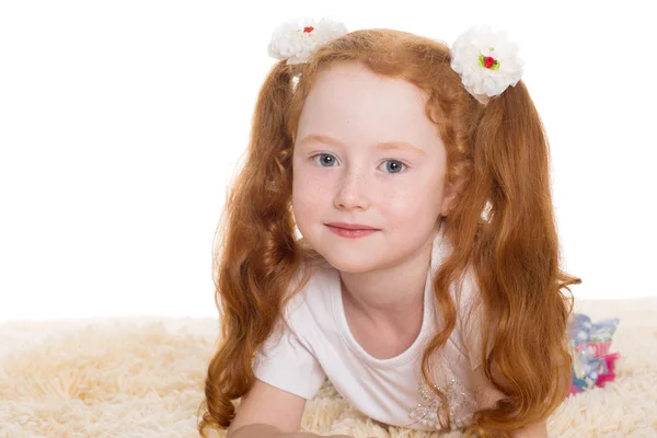 Little beautiful girl with red hair — Stock Photo, Image