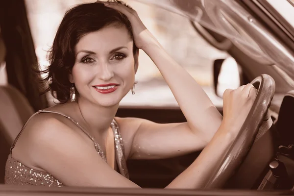 Beautiful woman driving a car — Stock Photo, Image