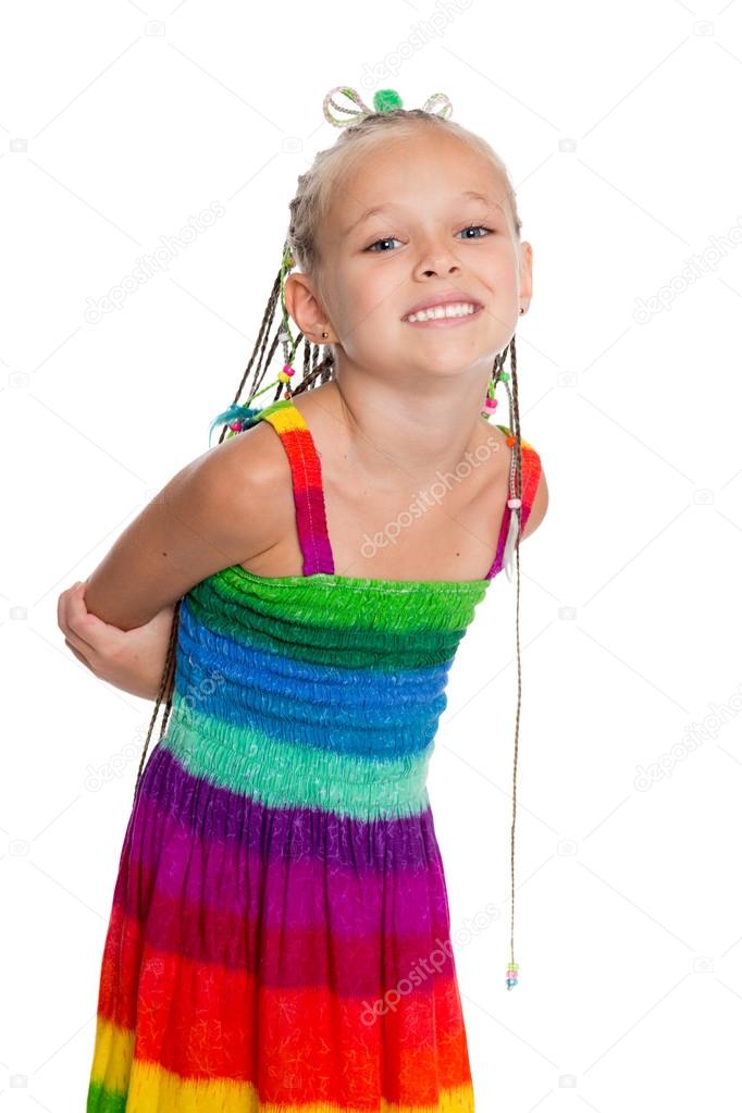 Lovely girl in a colorful summer dress