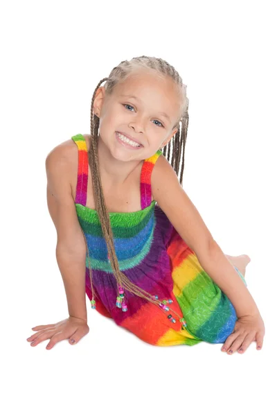 Счастливая маленькая девочка с дредами — стоковое фото