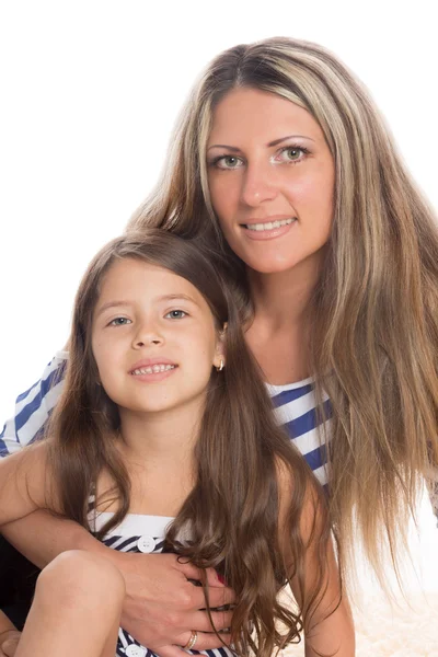 Retrato de una madre y una hija sonrientes — Foto de Stock