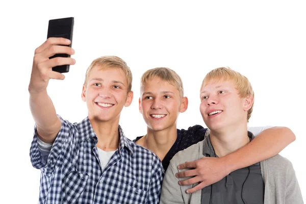 Drie jonge jongens nemen zelf — Stockfoto