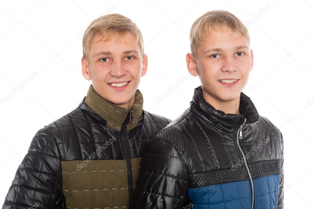 Twin brothers in autumn jacket