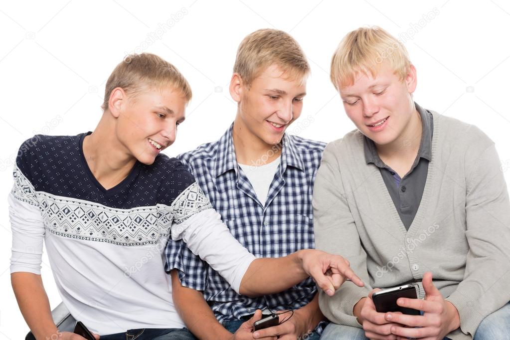 Young men use smartphones 