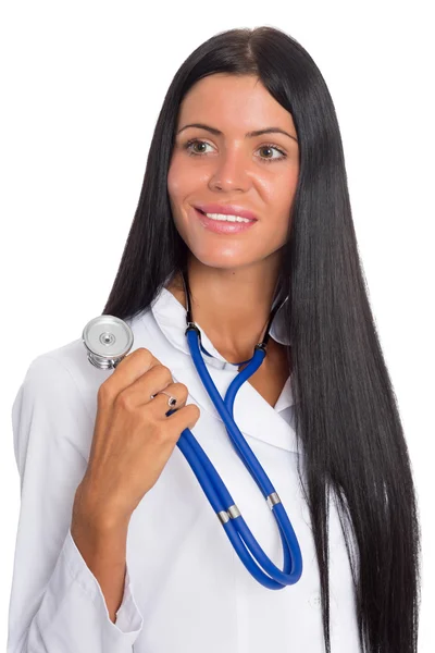 Snäll sjuksköterska hålla ett stetoskop — Stockfoto