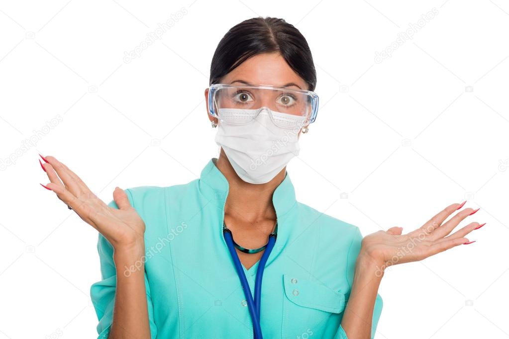 Female doctor gesturing do not know sign