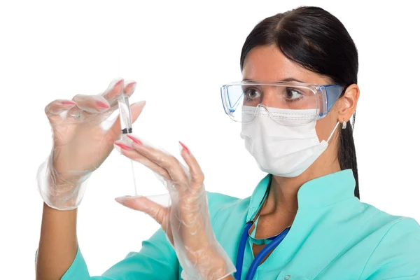 Doctor wearing prepares a syringe — Stock Photo, Image