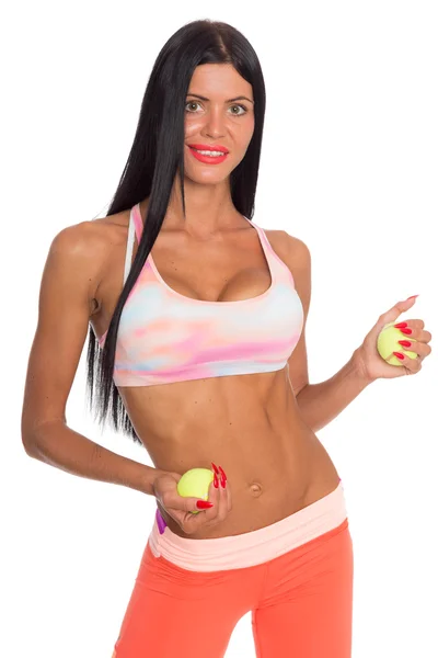 Bir tenis topu ile ince fitness genç kadın — Stok fotoğraf