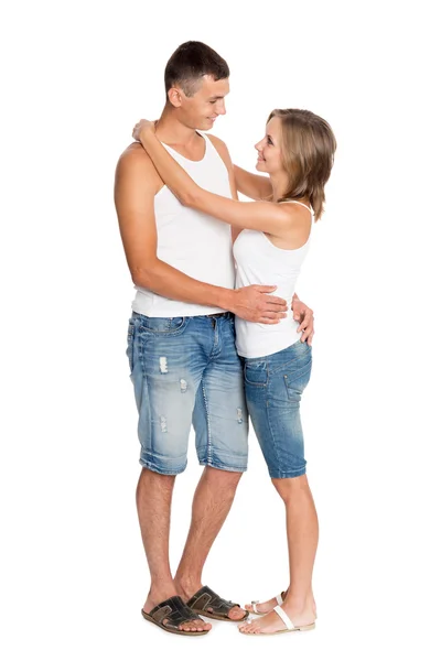 Young förälskad par i knäbyxor — Stockfoto