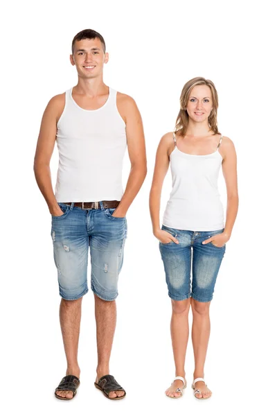 Portrait of young guy and girl in breeches — Stock Photo, Image