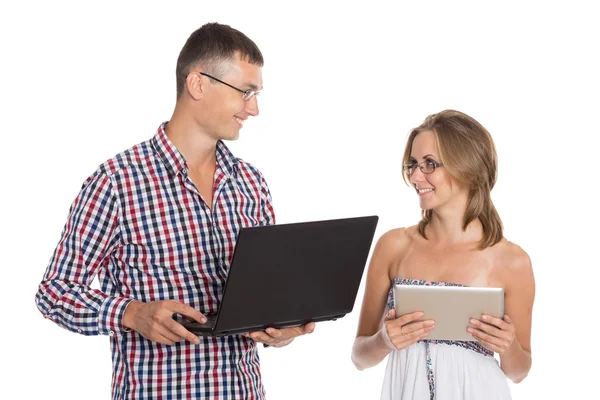 Jovem e mulher com um PC — Fotografia de Stock