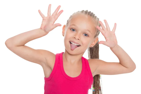 Pequena menina preso para fora sua língua — Fotografia de Stock