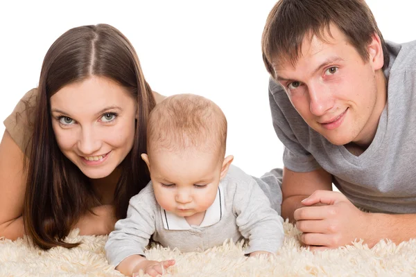 Gioioso giovani genitori con il loro figlio — Foto Stock