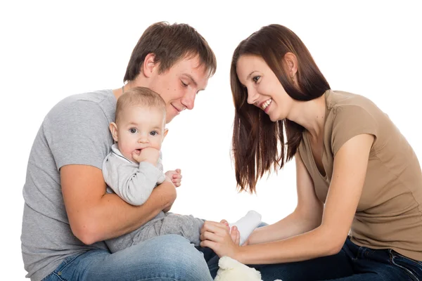 Cute boy and his young parents — Stock Photo, Image