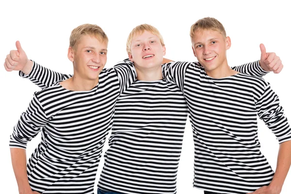 Grupo de caras em camisas listradas — Fotografia de Stock