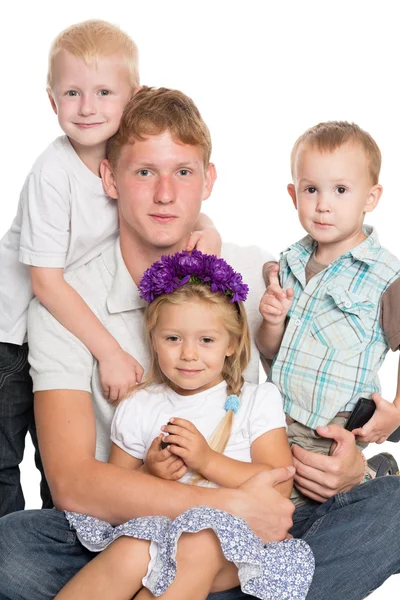 Younger brothers and sister with elder brother — Stock Photo, Image