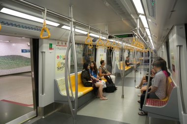 Passengers traveling on the subway in Singapore