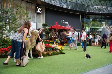 People relax at the ION Orchard, Singapore