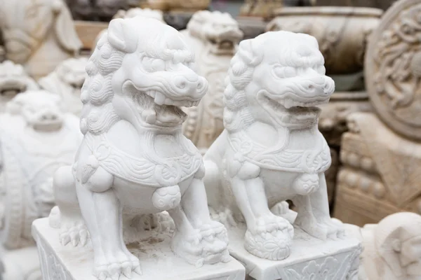 Chinese mythological sculpture in stone at a flea market — Stock fotografie